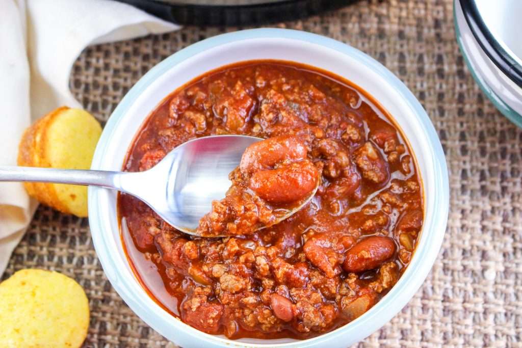 chili made with venison or deer meat in a white bowl