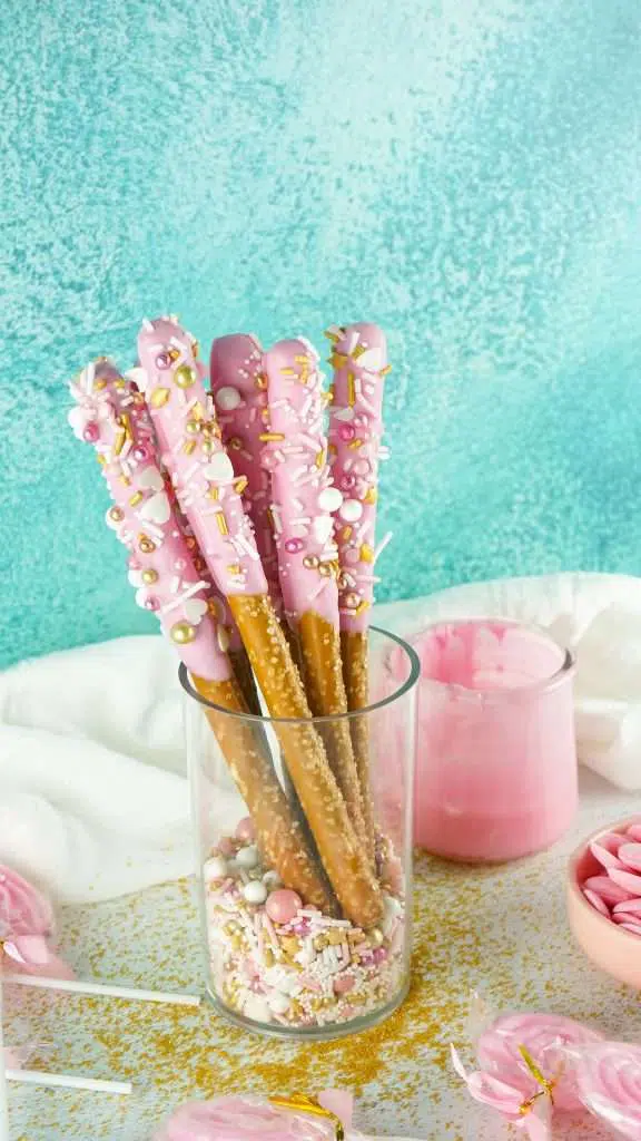 pink chocolate covered pretzels with sprinkles