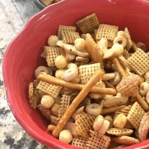 Party Mix Recipe 5 Party Mix Recipe in a red bowl.