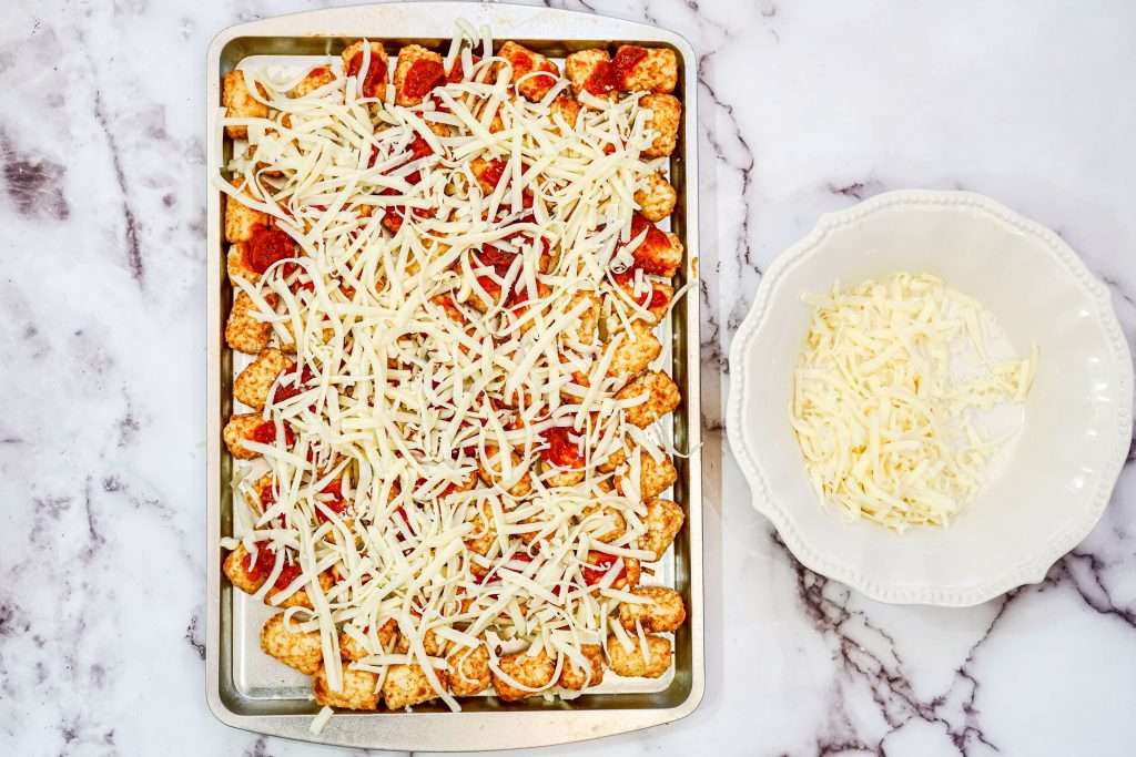How To Make Pizza Tots With Pepperoni & Mozzarella 9 adding mozzarella to pizza tots