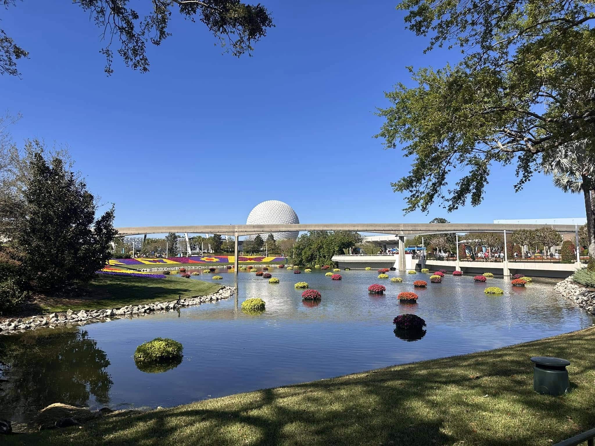 A view of the Spaceship Earth from across the pond at Walt Disney World, shot during daytime.