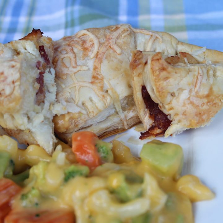 Savory Chicken Turnovers Recipe 12 chicken turnovers with vegetables on white plate
