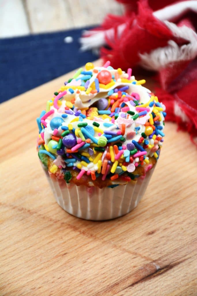 Spring Unicorn Cupcakes 6 adding the sprinkles and frosting