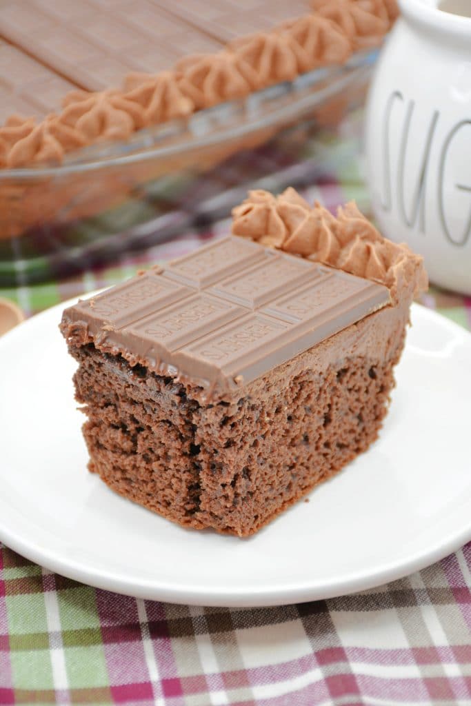 Hershey's Chocolate Cake a slice of Hershey's chocolate cake on white plate
