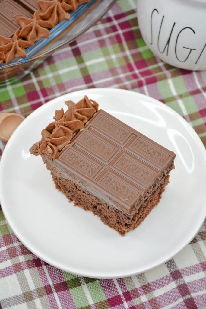 Hershey's Chocolate Cake overview of a slice of Hershey's chocolate cake on white plate