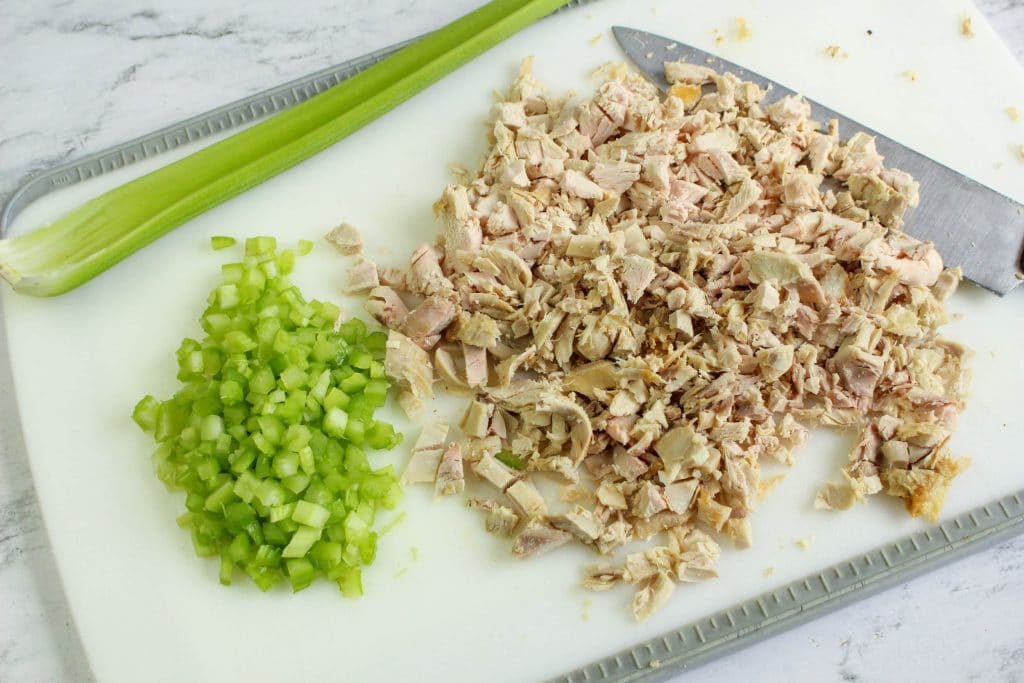 Quick and Easy-to-Prepare Rotisserie Chicken Salad Recipe 7 chopping up the ingredients for chicken salad