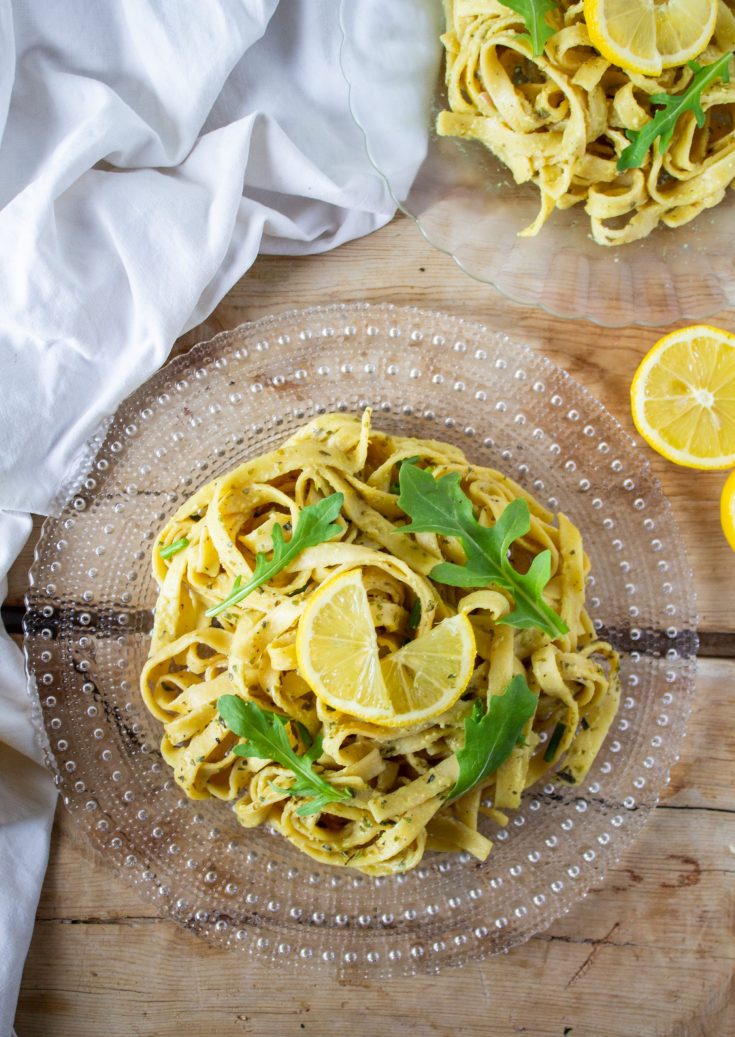 Quick One-Pot Lemon Pasta Recipe 10 one pot lemon pasta on a clear plate with lemon on top