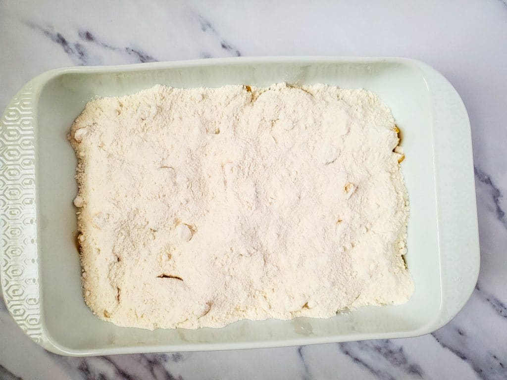 Easy Peach Dump Cake 4 cake mix added to the pan