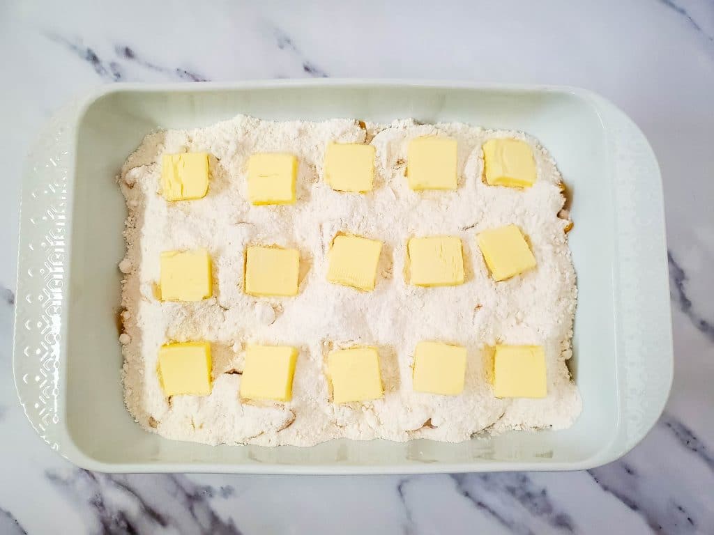 Easy Peach Dump Cake 5 pan with peaches, cake mix and butter