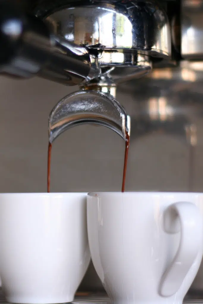 Setting Up a Coffee Bar at Home 3 coffee being poured into coffee cups