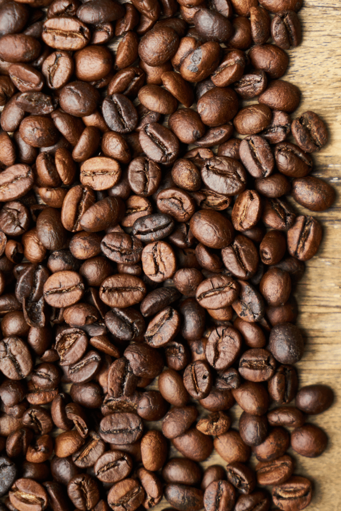 Setting Up a Coffee Bar at Home 4 coffee beans on wooden background