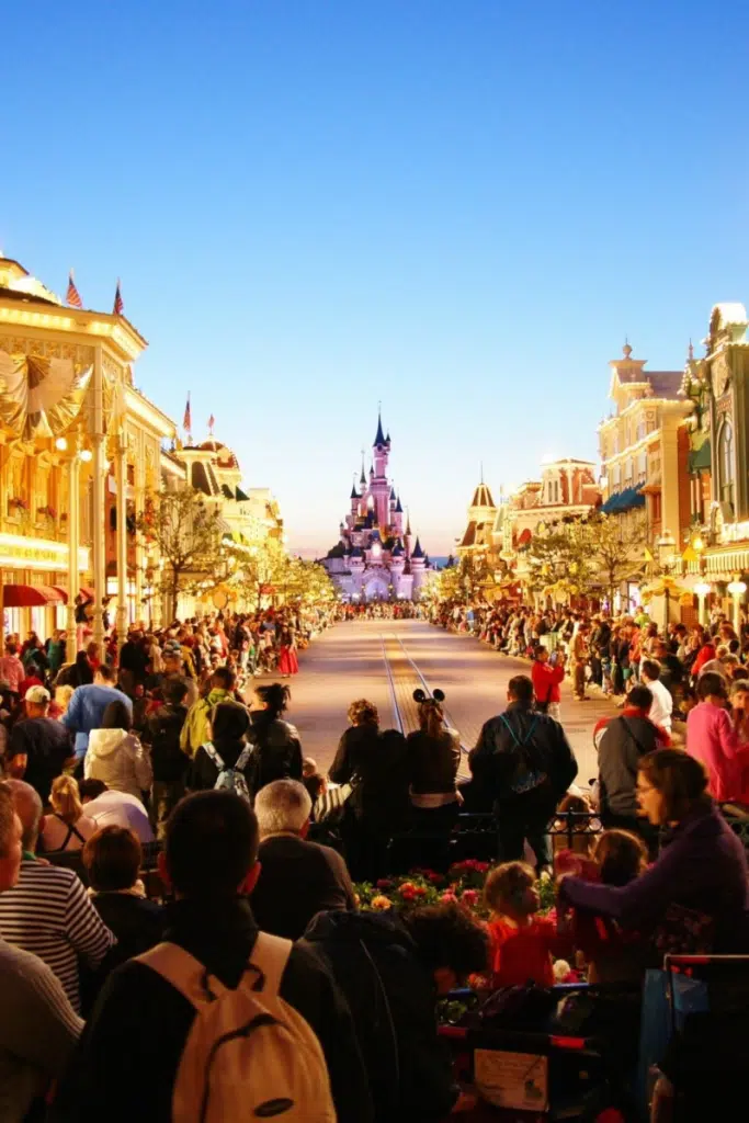 crowd in front of Disney castle