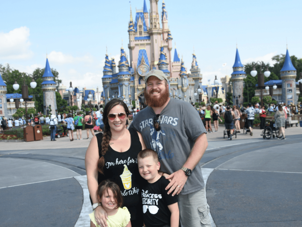 What to Wear to Disney World in October 3 family wearing t-shirts to Disney World in October