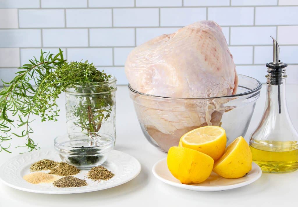 Quick Instant Pot Lemon and Herb Turkey Breast Recipe 9 Instant Pot lemon and herb turkey breast ingredients sitting on table