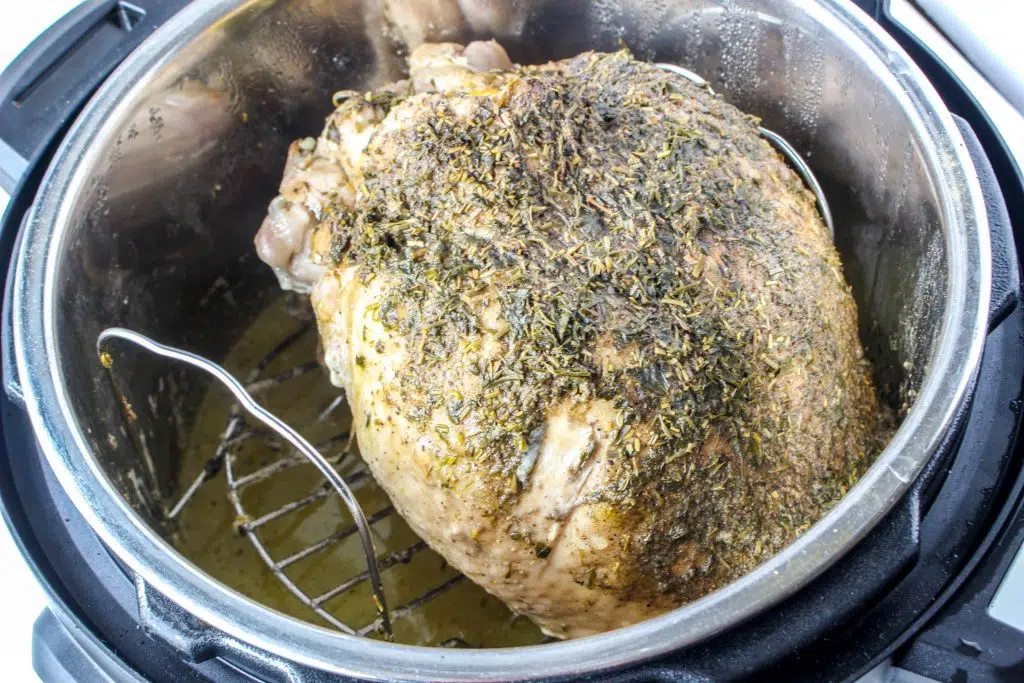 what turkey breast with seasonings on top in instant pot with drippings below 