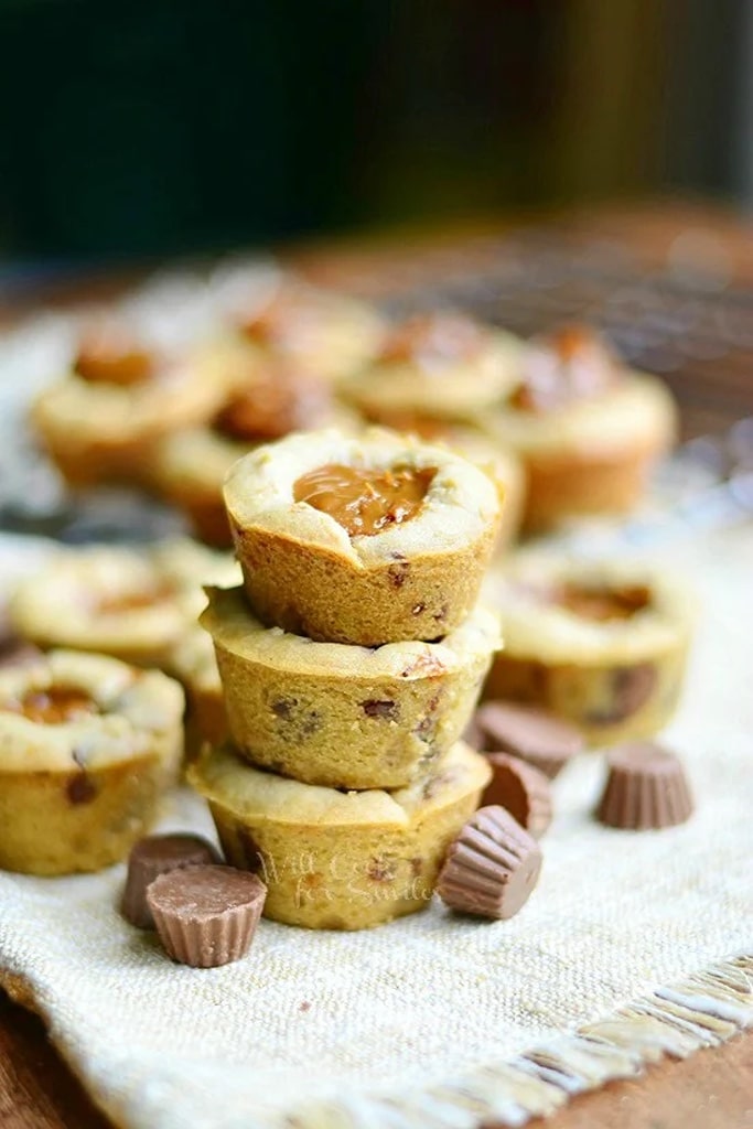 dulce de leche peanut butter cup cookies with mini Reese's cups on side 