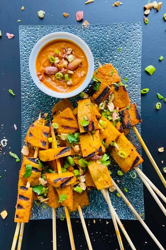 seitan satay skewers with dip on side 