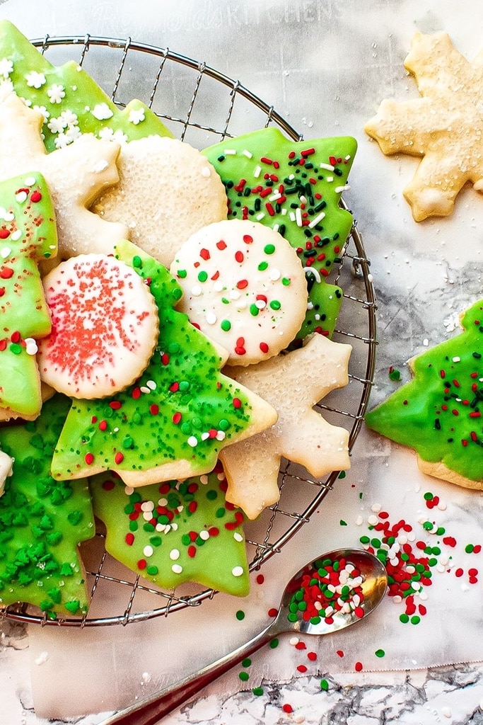 25 Old Fashioned Christmas Sugar Cookie Recipes 4 christmas cookies on plate
