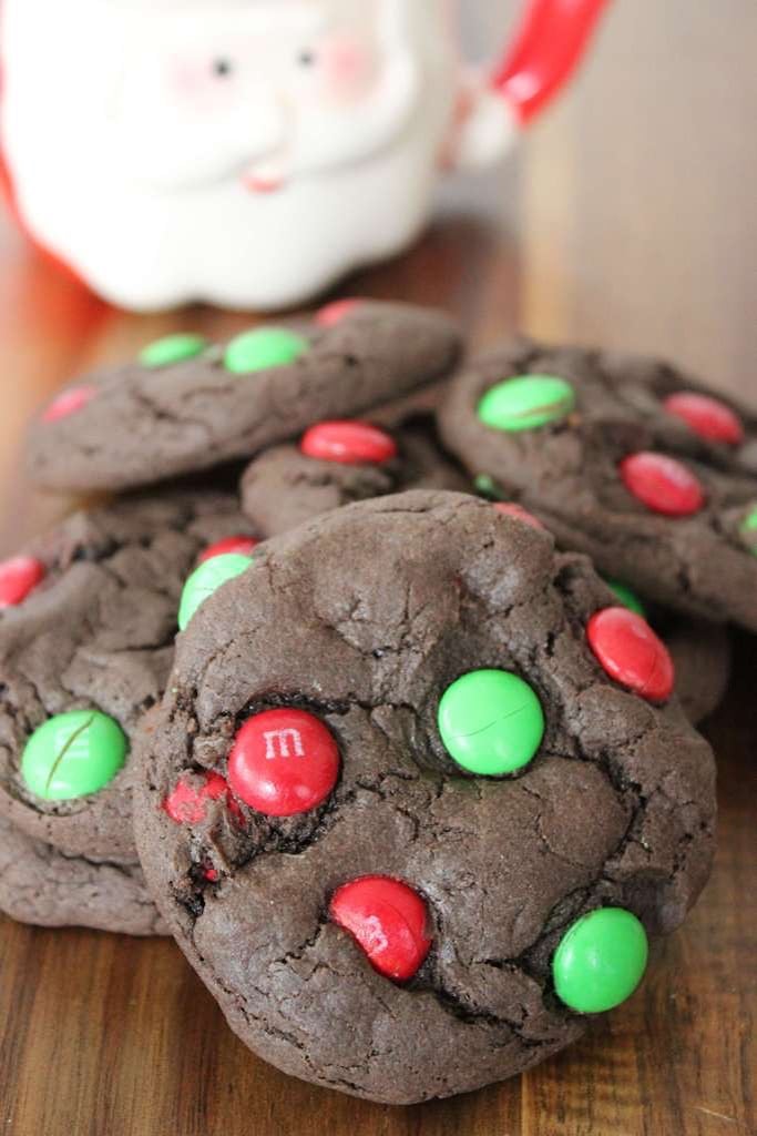 50 Easy Christmas Cookie Recipes with 7 Ingredients or Less 34 close up of chocolate cookies with red and green Christmas m&ms
