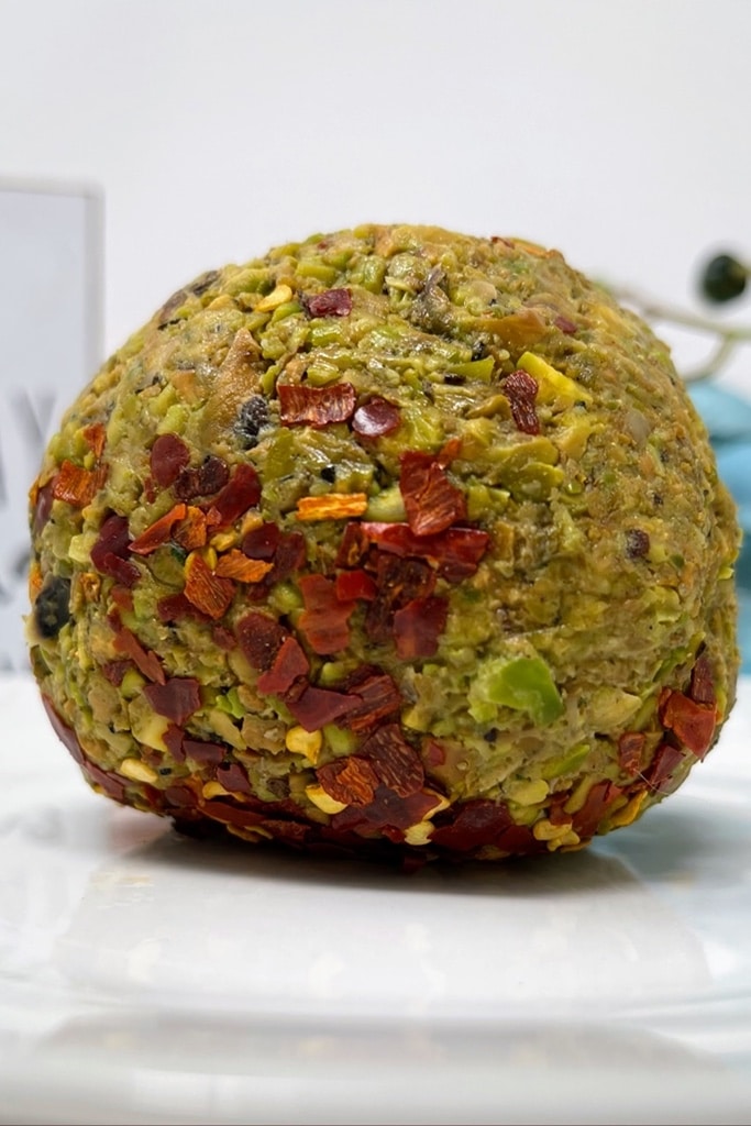 35 Party Appetizers For New Years Eve 40 vegan cheese with pistachios in ball with spices and seasonings