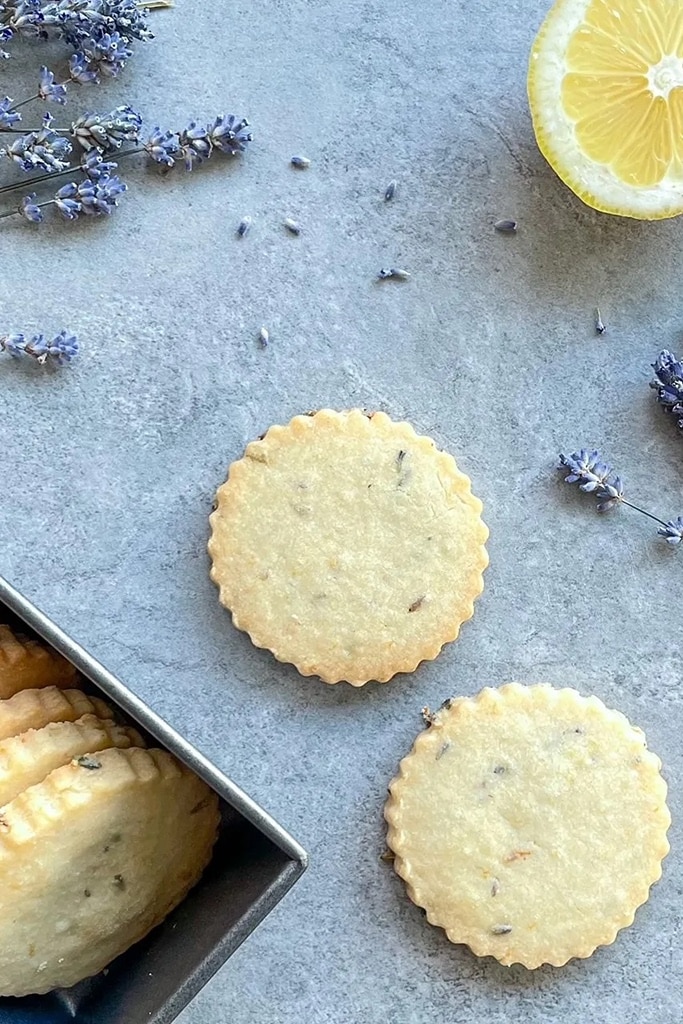 50 Easy Christmas Cookie Recipes with 7 Ingredients or Less 39 circular lemon lavender cookies with lavender springs on the side