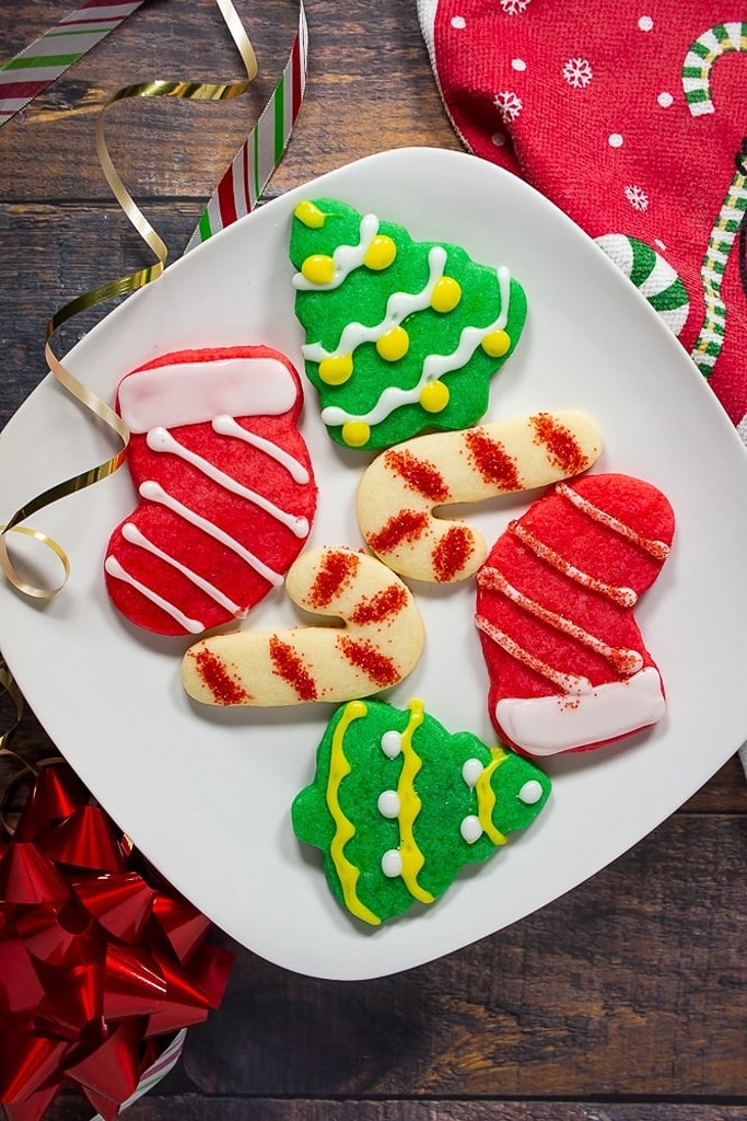 25 Old Fashioned Christmas Sugar Cookie Recipes 5 cookies on white plate