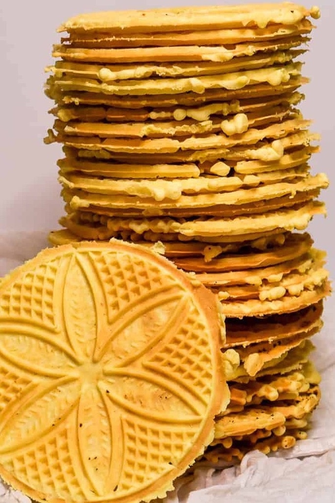 50 Easy Christmas Cookie Recipes with 7 Ingredients or Less 41 tall stack of anise pizzelles