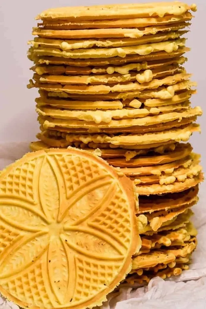 tall stack of anise pizzelles 