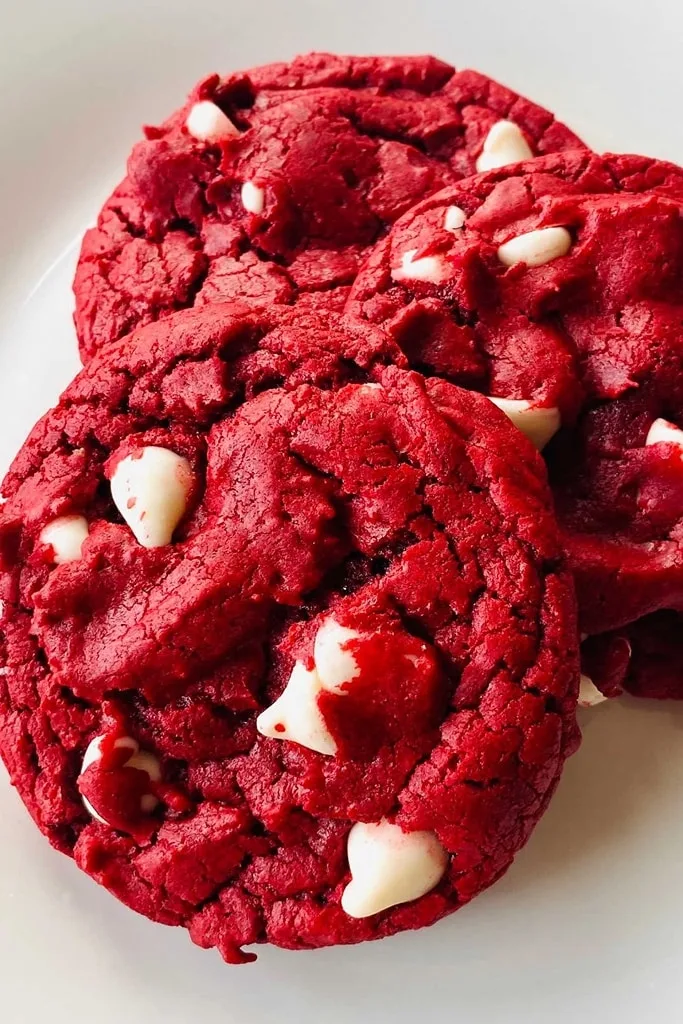 close up of red velvet cookies with white chocolate chips 