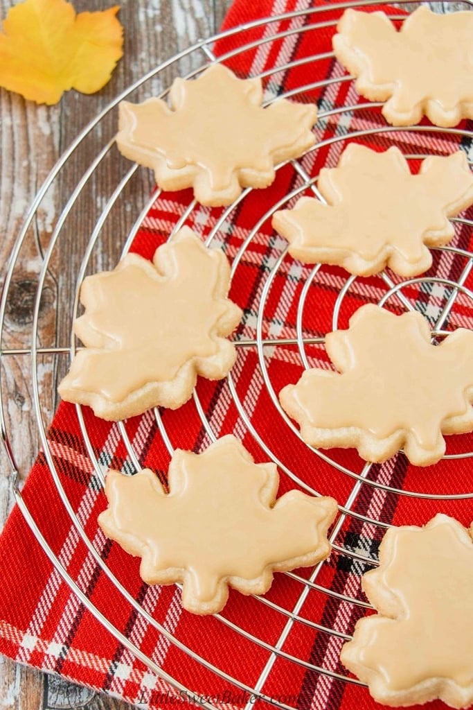 25 Old Fashioned Christmas Sugar Cookie Recipes 8 Cookes with maple glaze leaf shape on wire rack