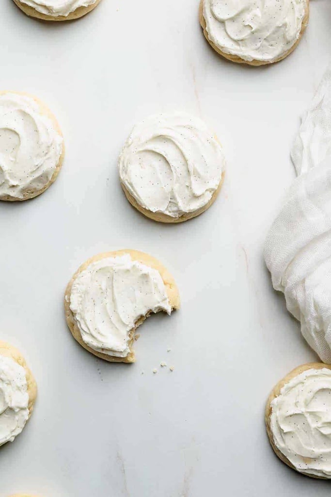 25 Old Fashioned Christmas Sugar Cookie Recipes 9 A close up of old fashioned sugar cookies with vanilla icing