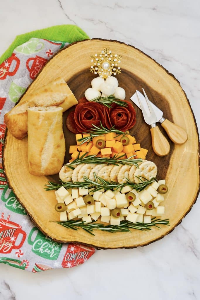 overhead view of Christmas tree board with meats and cheeses 