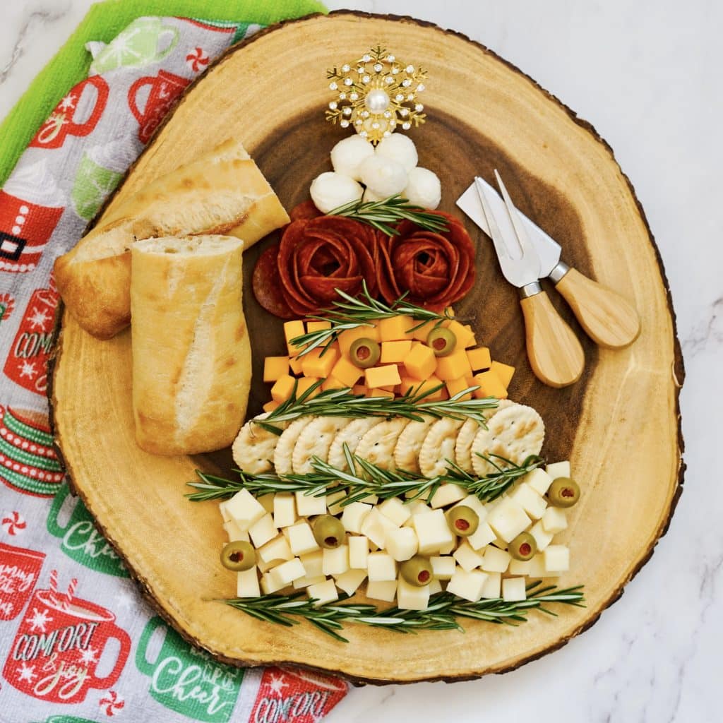 Easy Christmas Tree Charcuterie Board 3 charcuterie meats and cheeses in Christmas tree shape