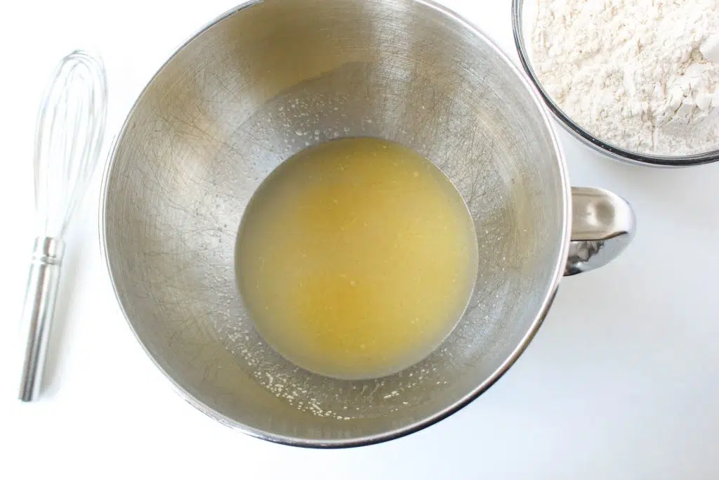 melted butter in stainless steel mixing bowl