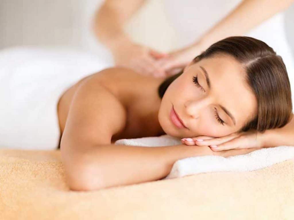 The Best Spa in Gatlinburg, TN 4 Woman with eyes closed getting a massge.