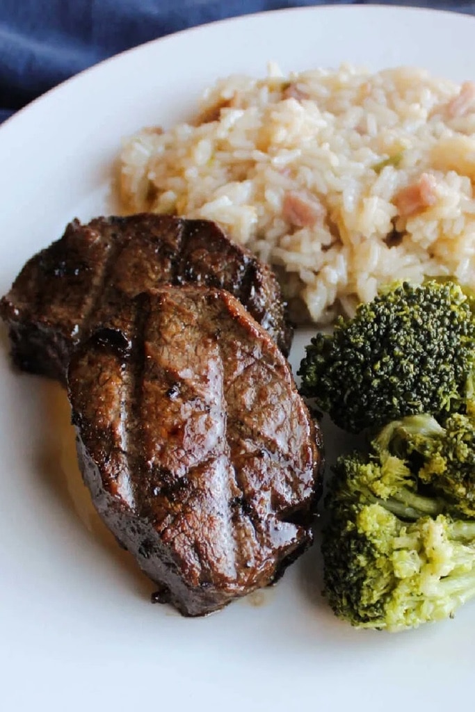 25 Venison Recipes You Will Love 11 pops bul kogi with broccoli and rice on white plate