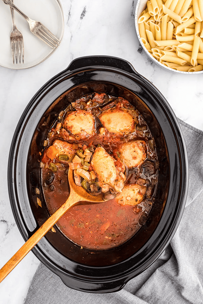 25 Boneless Skinless Chicken Thighs Recipes 14 boneless skinless chicken thigh cacciatore in crockpot with diced tomatoes and pasta on side