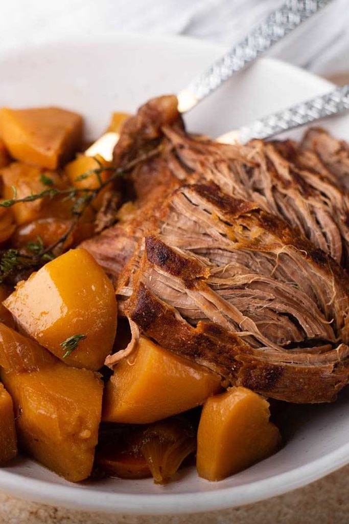 25 Venison Recipes You Will Love 14 pulled venison roast with potatoes on white bowl