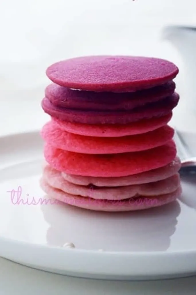 stack of valentines day colored ombre pancakes 