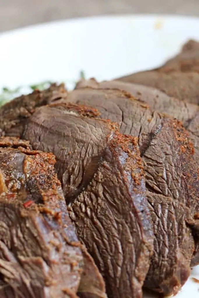 close up of sliced deer meat venison roast 