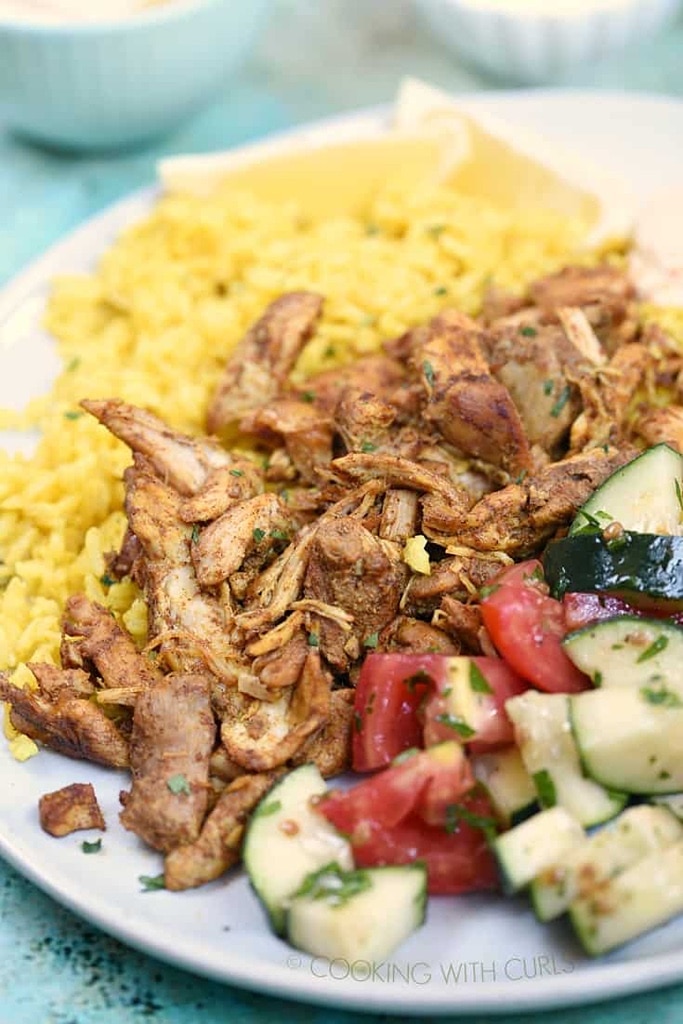 instant pot chicken thigh shawarma with rice and tomatoes and zucchini on side 