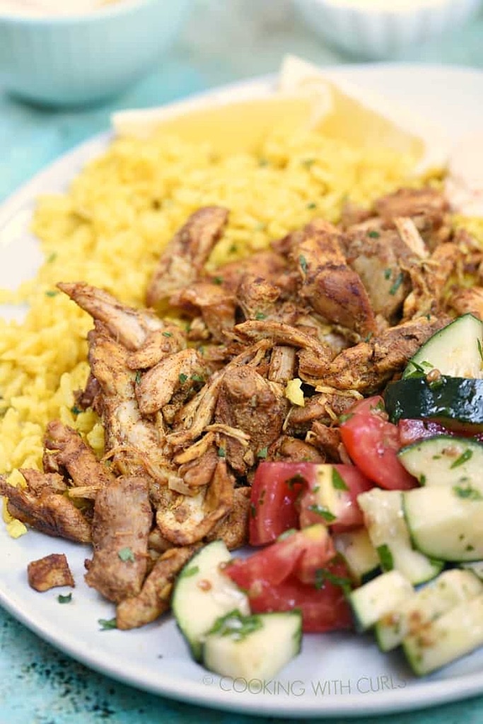 25 Boneless Skinless Chicken Thighs Recipes 20 instant pot chicken thigh shawarma with rice and tomatoes and zucchini on side
