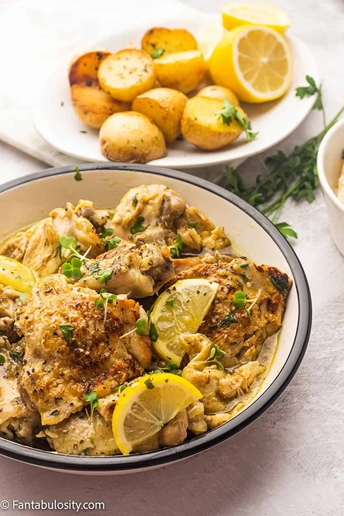 instant pot chicken thighs with lemons in serving bowl 