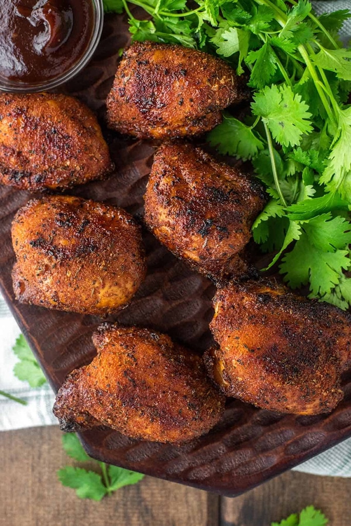 25 Boneless Skinless Chicken Thighs Recipes 25 smoked boneless skinless chicken thigh with bbq sauce on side