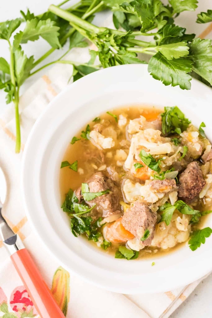 25 Venison Recipes You Will Love 6 overhead view of white bowl full of vegetable venison