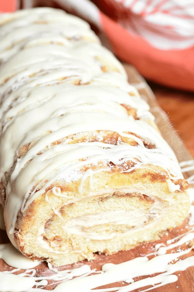 large homemade cinnamon roll with icing 