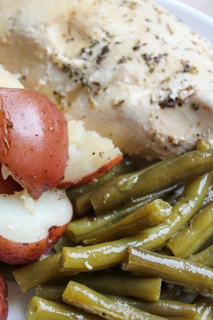 Slow Cooker Thanksgiving Recipes 12 chicken poatoes and green beans on white plate