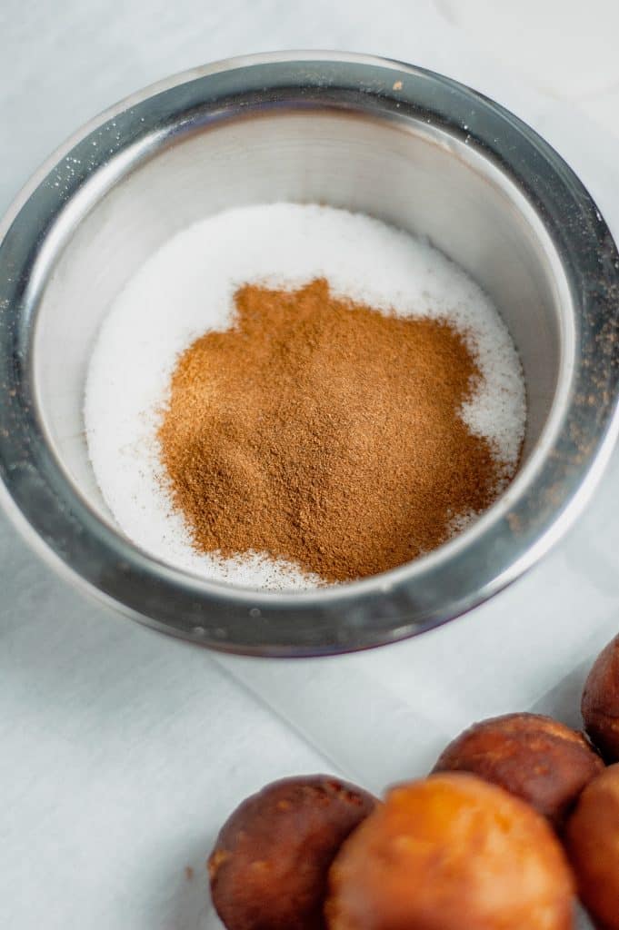 Cinnamon Sugar Donut Holes 23 cinnamon and sugar in bowl
