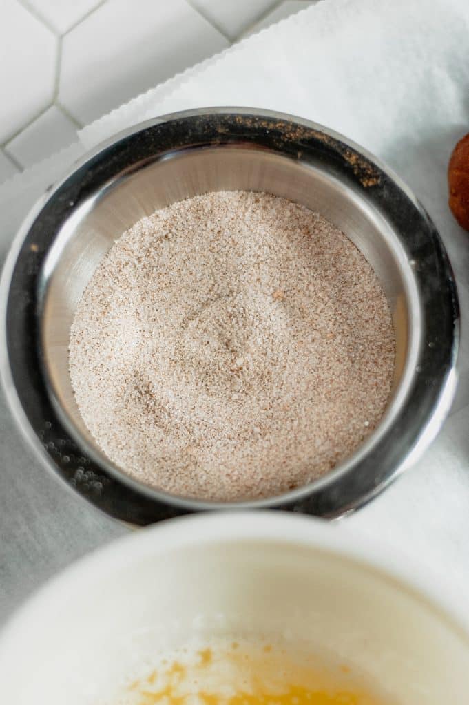 Cinnamon Sugar Donut Holes 26 cinnamon sugar mixture in bowl