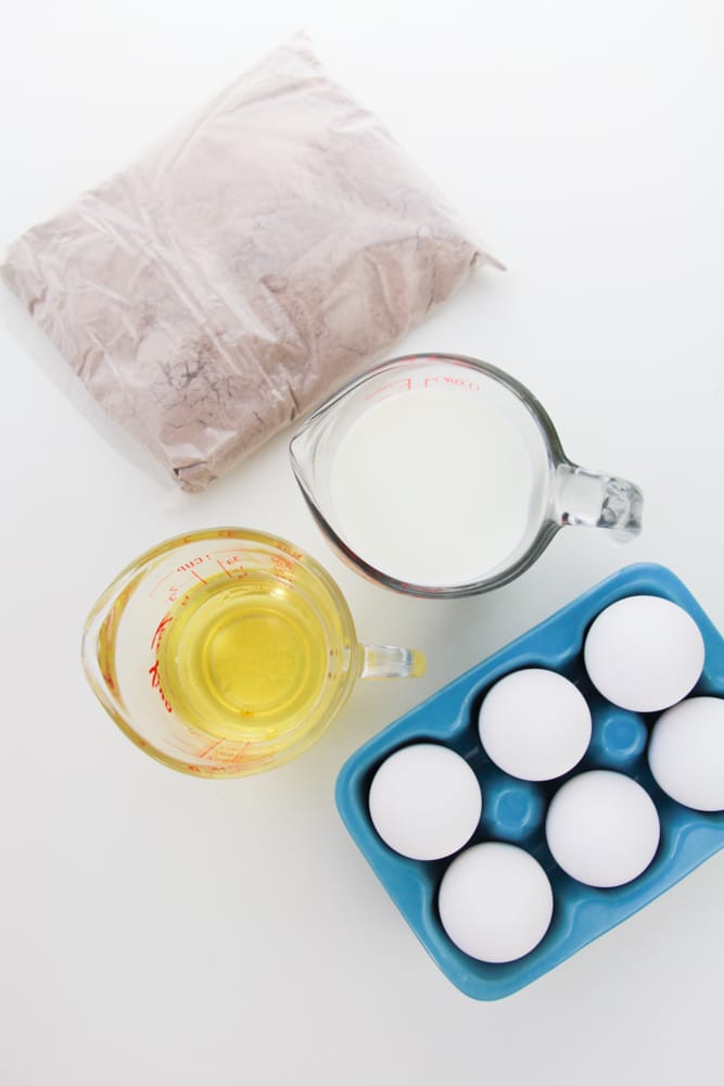 Chocolate Mickey Mouse Waffles 14 chocolate mickey waffles ingredients in measuring cups and egg carton